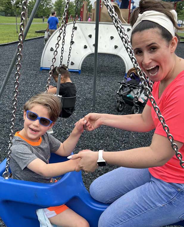 Teachers and aides working with a male The Larc Norcross School Preschool student